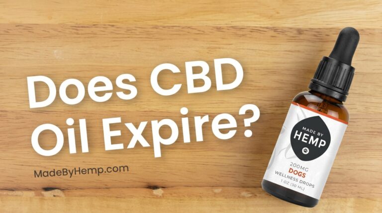 Made By Hemp CBD oil bottle on a wood table — does CBD oil expire?